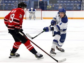 The Windsor Spitfires acquired defenceman Nathan Ribau, right, from the Sudbury Wolves on Tuesday along with a third-round draft pick for defenceman Dylan Robinson.