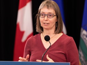 Dr. Deena Hinshaw, Alberta chief medical officer of health, responds to a reporter’s question during a Government of Alberta COVID-19 press conference announcing new measures in schools in Edmonton, on Tuesday, Oct. 5, 2021.