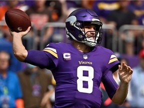 Kirk Cousins of the Minnesota Vikings throws a pass during the second quarter in the game against the Cleveland Browns at U.S. Bank Stadium on October 03, 2021 in Minneapolis, Minnesota.