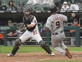 Willi Castro of the Detroit Tigers scores against Zack Collins of the Chicago White Sox during the ninth inning of a game at Guaranteed Rate Field on October 03, 2021 in Chicago, Illinois. The Tigers defeated the White Sox 5-2.