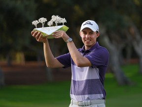 Matthew Fitzpatrick of England poses with the trophy after winning The Estrella Damm N.A. Andalucia Masters at Real Club Valderrama on October 17, 2021 in Cadiz, Spain.