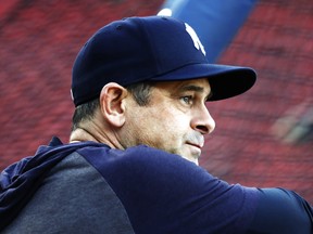 Manager Aaron Boone of the New York Yankees looks on before a game against the Boston Red Sox at Fenway Park on September 26, 2021 in Boston.