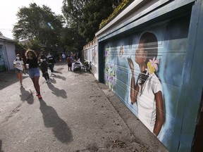 Butterfly Lane was officially unveiled in the heart of Walkerville on Saturday, Oct. 2, 2021.  A total of 15 artists created 16 murals off of Ontario Street near Argyle.