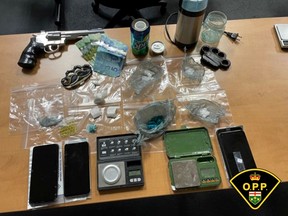 Leamington OPP seized suspected fentanyl, cocaine, methamphetamine, and weapons from an address on Westmoreland Avenue on Oct. 14, 2021.