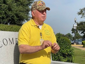 Allbritton with the Purple Heart medal that was recently returned to him.