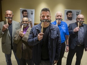 Grow On ambassadors, from left, Roger Beneteau, Daniel Thomas, Fred Francis, Jim Fair, and Jamie Matchett pose with their Grow On moustaches during the kickoff to this year's fundraising campaign at the Ciociaro Club, on Friday, Oct. 28, 2021.