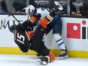Winnipeg Jets left wing Nikolaj Ehlers and Anaheim Ducks center Ryan Getzlaf tangle on the ice in the third period at Honda Center.