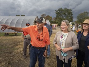 Provincial NDP leader, Andrea Horwath, along with Lisa Gretzky, MPP for Windsor-West, visits with Roger Rocheleau, owner of Pepe's Pumpkin Patch, on Thursday, Oct. 21, 2021.