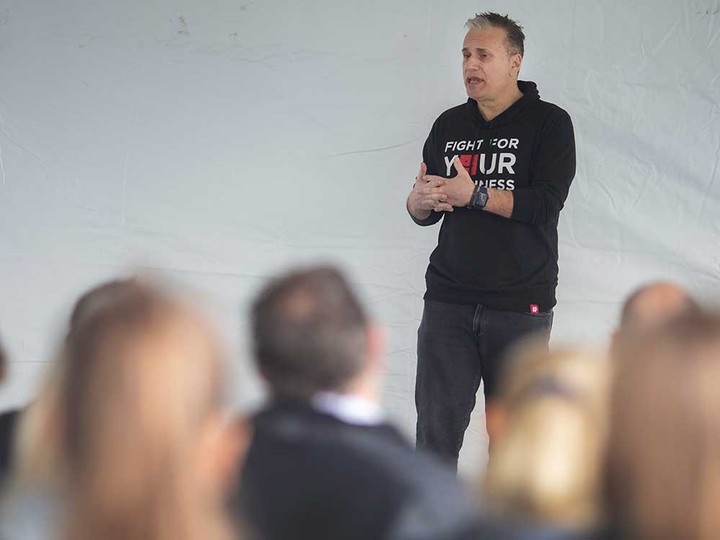  Former TSN television personality Michael Landsberg speaks about mental health at Fury Training Grounds in Essex on Oct. 16, 2021.