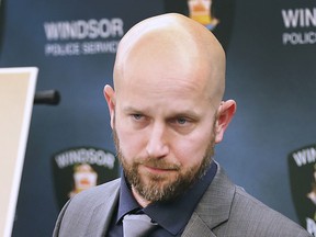 Windsor Police Det. Scott Chapman takes questions during a press conference on Friday, December 13, 2019. Chapman has been recognized with a citation by the OPP.