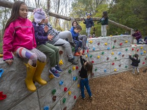 Students from the Natural Pathways Forest and Nature School play on the new Enbridge Natural Playground at Holiday Beach Conservation Area in Amherstburg, on Wednesday, Oct. 27, 2021.