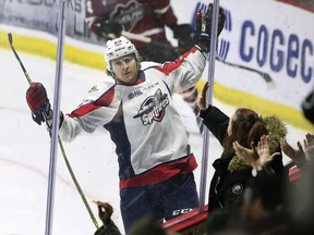 Windsor Spitfires' forward Kyle McDonald celebrates a first-period goal during Thursday's 6-3 win over the Guelph Storm at the WFCU Centre.