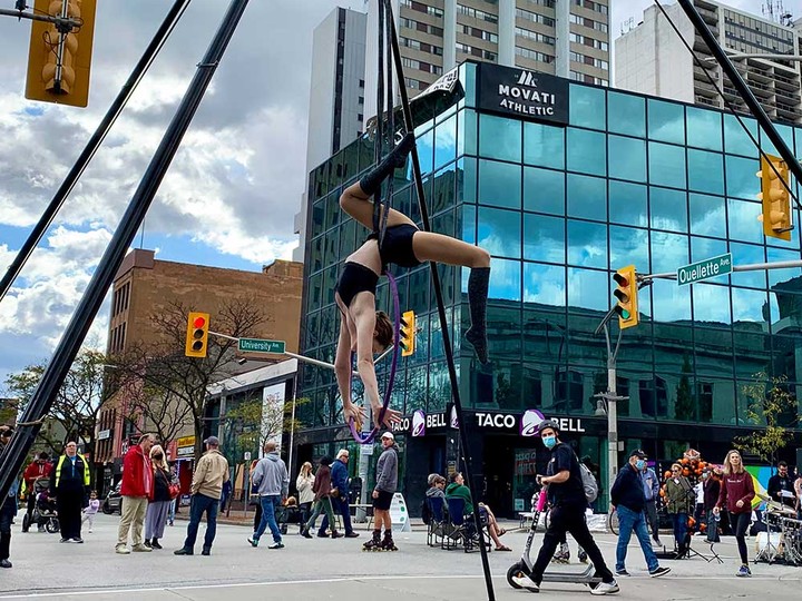  Chantal Borland, a student of Erikka Johnson’s Starlight Aerial Co., performs in downtown Windsor during Open Streets Windsor 2021. Photographed Oct. 17, 2021.