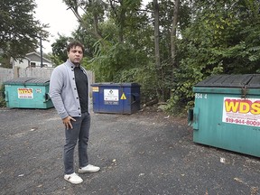 Ward 2 Coun. Fabio Costante stands nearby some dumpsters on Sandwich Street on Oct. 5, 2021.