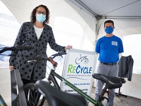Michelle Bishop (left), general manager of the Essex-Windsor Solid Waste Authority, and EWSWA board chair Aldo DiCarlo, mayor of Amherstburg, launch a new bike drop off depot to keep bicycles out of the dump on Thursday, Oct. 21, 2021.
