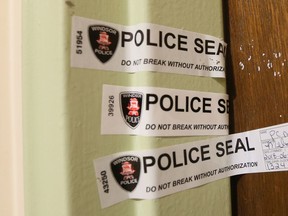 Windsor Police seal the door to Autumn Taggart's apartment #7 on the third floor at 1382 University Ave. West on June 12, 2018.