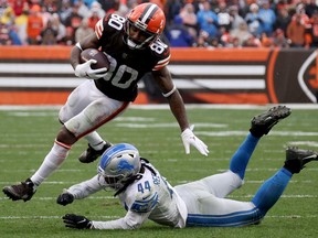 Jarvis Landry of the Cleveland Browns runs with the ball against Jalen Reeves-Maybin of the Detroit Lions in the second quarter at FirstEnergy Stadium on November 21, 2021 in Cleveland, Ohio.