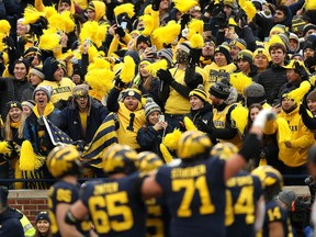Michigan fans cheer from the stands in the second half of the game against the Ohio State Buckeyes at Michigan Stadium on November 27, 2021 in Ann Arbor, Michigan.