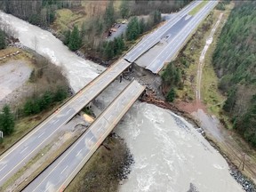 The Coquihalla Highway 5 is severed at Sowaqua Creek after devastating rain storms caused flooding and landslides, northeast of Hope, B.C., Nov. 17, 2021.