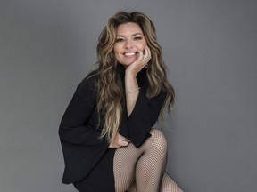 Shania Twain poses for a portrait at her Manhattan hotel, Friday, June 14, 2019, in New York.