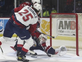 Windsor Spitfires' forward Kyle McDonald scores on the power play during Friday's 6-5 loss to the Saginaw Spirit at the WFCU Centre.