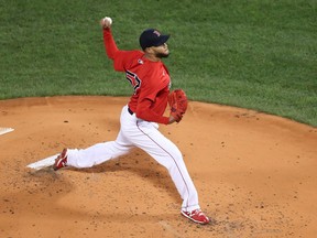 Boston Red Sox starting pitcher Eduardo Rodriguez pitches against the Houston Astros during the first inning of game three of the 2021 ALCS at Fenway Park.