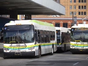A Windsor Transit bus makes a stop at the Windsor International Transit Terminal, on Monday, Nov. 15, 2021.