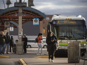 A Windsor Transit bus makes a stop at the Windsor International Transit Terminal, on Monday, Nov. 15, 2021.