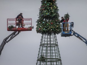 WINDSOR, ONTARIO:. NOVEMBER 9, 2021 - It's beginning to look a lot like Christmas - crews construct the giant Christmas Tree at the centre of the Bright Lights Festival at Jackson Park, on Tuesday, Nov. 9, 2021.