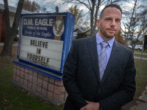 Mario Spagnuolo, Greater Essex president of the Elementary Teachers' Federation of Ontario, stands outside D. M. Eagle Public School in Tecumseh on Nov. 18, 2021.
