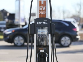 An electric vehicle charging station is shown at the Devonshire Mall in Windsor on Friday, November 19, 2021.