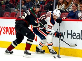 Edmonton Oilers center Colton Sceviour moves the puck against Arizona Coyotes defenseman Anton Stralman during the first period at Gila River Arena.