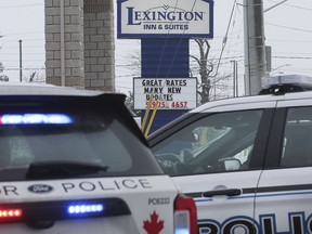 Windsor police officers are pictured at the Lexington Inn & Suites hotel in Windsor on Sunday, November 28, 2021.