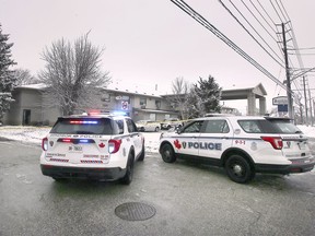 Windsor police officers are pictured at the Lexington Inn & Suites hotel in Windsor on Sunday, November 28, 2021.