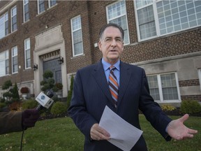 Windsor West MP, Brian Masse, holds a press conference in front of the St. Genevieve Place Lofts, on Thursday, Nov. 18, 2021.
