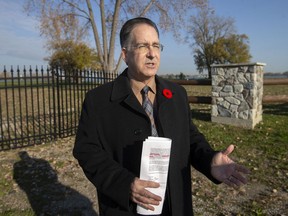 MP for Windsor West, Brian Masse, holds a press conference at the foot of Riverside Drive East and Lauzon Road, the site of the former historic Abars Island View Hotel, on Friday, Nov. 5, 2021.