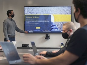 Agostino Di Pietro, director of technology with Rocket Innovation Studio in Windsor speaks to team members at the downtown office on Wednesday, November 3, 2021. The company help the local United Way organization with their latest campaign.