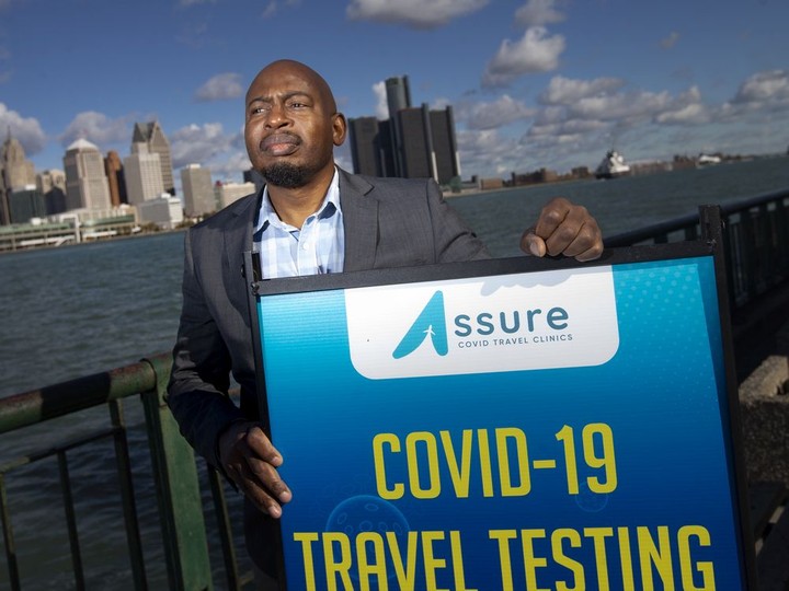  Phllip Olla, executive director of Assure Clinics, a new company established to help Canadians get set up in Detroit for cheaper and quicker PCR testing, is pictured at the waterfront, on Wednesday, Nov. 3, 2021.