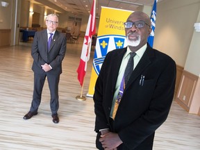 University of Windsor president Robert Gordon (left) is pictured Nov. 17, 2021, with Clinton Beckford (right), the school's vice-president of equity, diversity and inclusion.