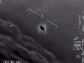 This file video grab image obtained April 28, 2020 and courtesy of the U.S. Department of Defense shows part of an unclassified video taken by Navy pilots that have circulated for years showing interactions with "unidentified aerial phenomena."