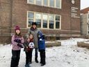 Teacher and parent Shauna Ellis with her children outside Bowmore Public School.