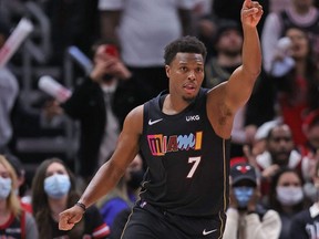 Kyle Lowry of the Heat celebrates after hitting a shot late in the game against the Bulls at the United Center in Chicago, Nov. 27, 2021.