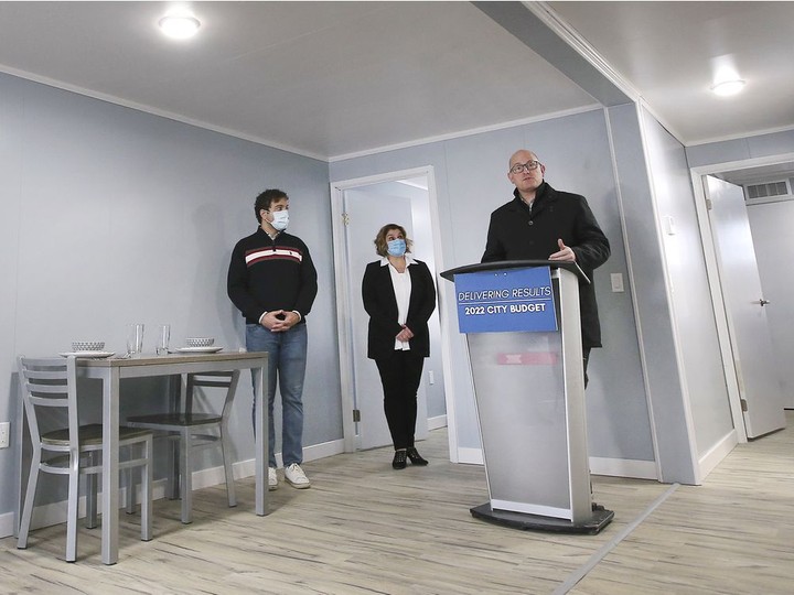  Windsor Mayor Drew Dilkens right, speaks during a press conference on Monday, December 6, 2021, as city councillor Fabio Costante and the city’s commissioner of human and health services Jelena Payne look on. The city unveiled a new affordable housing project located in the 200 block of Watkins Street in the city’s west end.