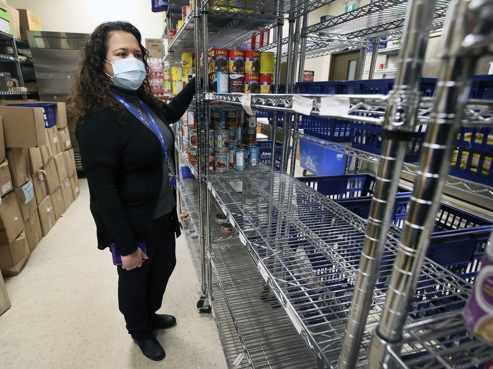  Rukshini Ponniah-Goulin, interim executive director of the Downtown Mission is shown at the organization’s food bank on Tuesday, December 7, 2021. There is a shortage of donations and volunteers.