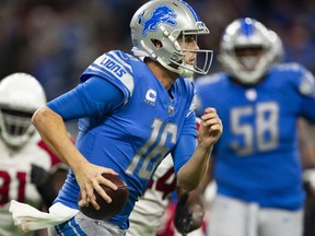 Detroit Lions quarterback Jared Goff runs with the ball during the fourth quarter against the Arizona Cardinals at Ford Field.