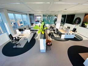 A prototype office of international real estate company Cushman & Wakefield with a workplace design concept using the ?six feet rule? (two metres) of coronavirus disease (COVID-19) social distancing to keep areas around desks empty is seen in Amsterdam, Netherlands in a picture obtained by Reuters May 6, 2020.