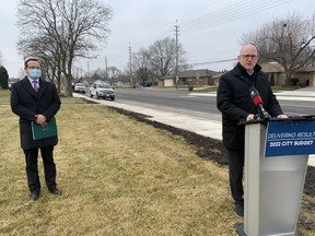 Windsor Mayor Drew Dilkens, right, provides an update Tuesday on the $50-million Cabana Road widening and reconstruction project. Phase 3 of the five-phase project from Dougall Avenue to Dominion Boulevard has just been completed, with Phase 4 from Dominion to Highway 3 already underway. To the left is MP Irek Kusmierczyk (L Ñ Windsor-Tecumseh), whose government provided almost $1 million towards the $26.8-million cost of Phases 3 and 4.