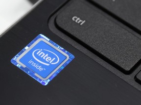 An Intel Corporation logo is seen on a sticker on a laptop for sale in Queens, New York, U.S., November 16, 2021.