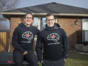 Jessica Gaudette, left, and Chris Elliott, co-founders of Kind Mind, are pictured in front of the newly purchased home they bought to use as a supportive living home for adults with disabilities, on Thursday, Dec. 23, 2021.