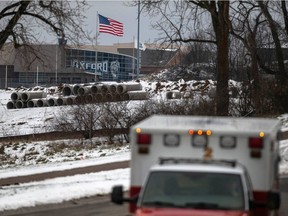 Emergency personnel respond to the scene of a deadly shooting where at least three were killed and six were wounded at a high school in Oxford, Michigan, about 35 miles (55 km) north of Detroit, U.S., November 30, 2021.